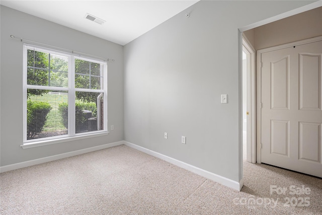 17111 Doe Valley Ct, Cornelius, NC 28031 - carpeted spare room featuring baseboards