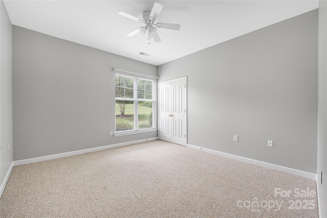 17111 Doe Valley Ct, Cornelius, NC 28031 - carpeted spare room with baseboards and ceiling fan