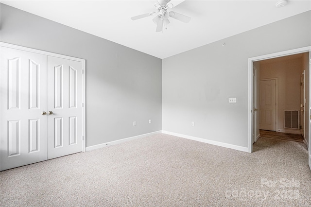 17111 Doe Valley Ct, Cornelius, NC 28031 - unfurnished bedroom with carpet floors, baseboards, a closet, and ceiling fan
