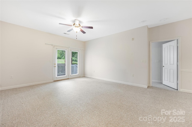 17111 Doe Valley Ct, Cornelius, NC 28031 - carpeted empty room with a ceiling fan and baseboards