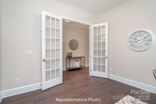 interior space with french doors, wood finished floors, and baseboards