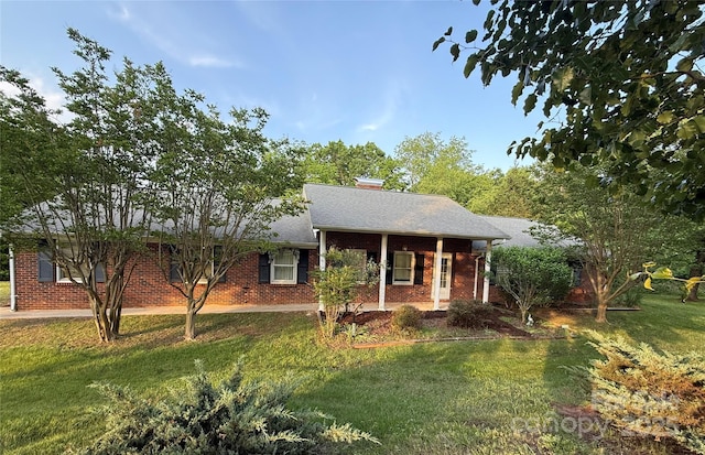 4306 Joplin Rd, Hudson, NC 28638 - single story home with a front yard, brick siding, and a shingled roof