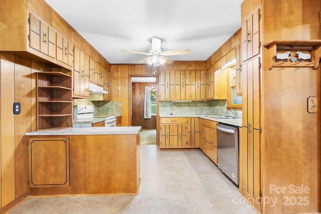 4306 Joplin Rd, Hudson, NC 28638 - kitchen with electric stove, stainless steel dishwasher, under cabinet range hood, and backsplash