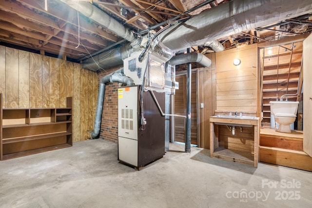 4306 Joplin Rd, Hudson, NC 28638 - unfinished basement with heating unit and wood walls