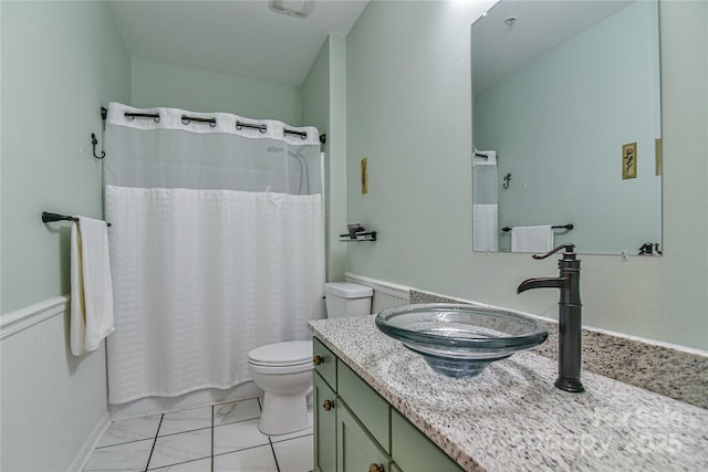 214 Appeldoorn Cir, Asheville, NC 28803 - full bathroom with toilet, vanity, and wainscoting