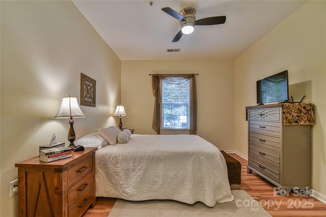 214 Appeldoorn Cir, Asheville, NC 28803 - bedroom featuring light wood-style flooring, ceiling fan, and baseboards