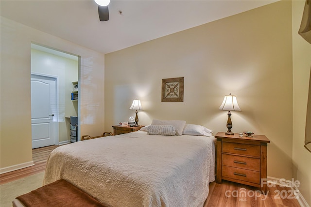 214 Appeldoorn Cir, Asheville, NC 28803 - bedroom featuring wood finished floors, baseboards, and ceiling fan