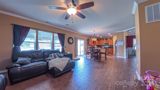 5003 Singletree Ln, Indian Trail, NC 28079 - living area with ornamental molding, dark wood-style floors, ceiling fan, baseboards, and recessed lighting