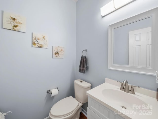 5003 Singletree Ln, Indian Trail, NC 28079 - half bathroom featuring vanity and toilet