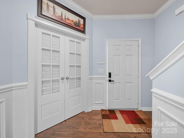 5003 Singletree Ln, Indian Trail, NC 28079 - foyer with dark wood finished floors, crown molding, french doors, and a wainscoted wall