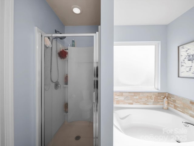 5003 Singletree Ln, Indian Trail, NC 28079 - bathroom featuring a stall shower and a garden tub