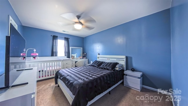 5003 Singletree Ln, Indian Trail, NC 28079 - carpeted bedroom with ceiling fan and baseboards