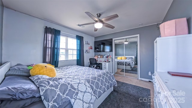 5003 Singletree Ln, Indian Trail, NC 28079 - carpeted bedroom with a closet and a ceiling fan