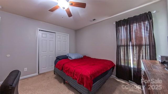 5003 Singletree Ln, Indian Trail, NC 28079 - carpeted bedroom with a closet and a ceiling fan