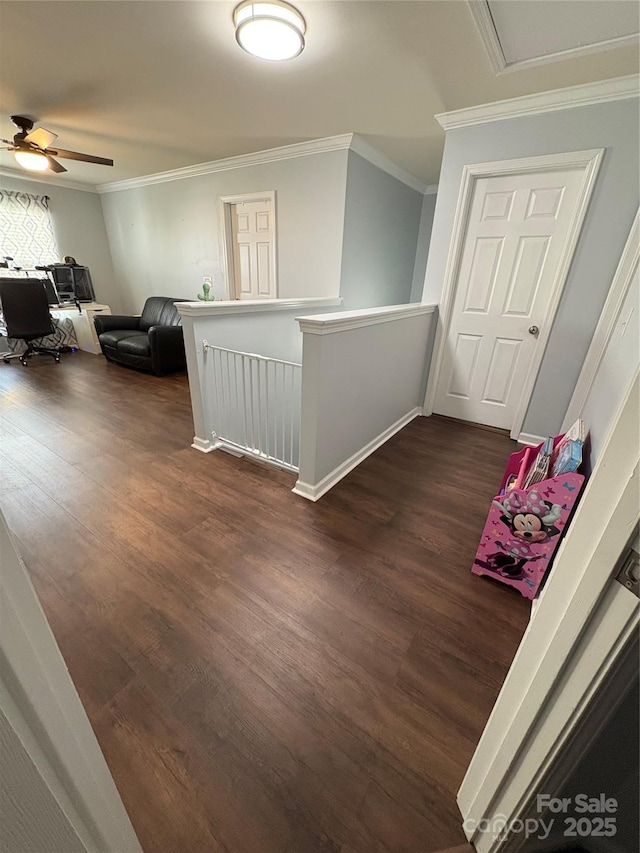 5003 Singletree Ln, Indian Trail, NC 28079 - corridor featuring dark wood-type flooring, ornamental molding, and an upstairs landing