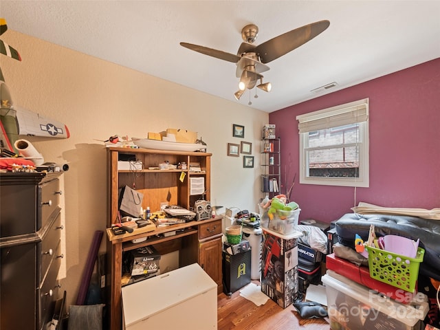 3407 Thickety Rd, Clyde, NC 28721 - office area featuring light wood-style floors and a ceiling fan