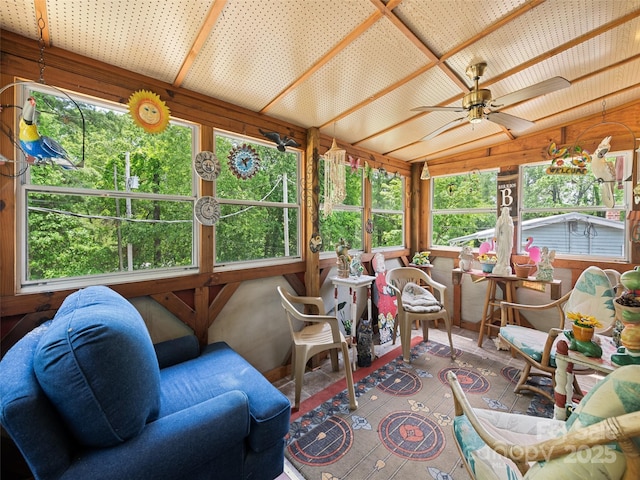 3407 Thickety Rd, Clyde, NC 28721 - sunroom with lofted ceiling, a ceiling fan, healthy amount of natural light, and wooden walls