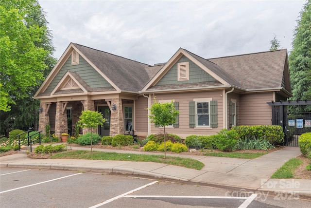 70 Rose Creek Rd, Leicester, NC 28748 - craftsman house featuring uncovered parking, stone siding, and roof with shingles
