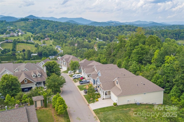 70 Rose Creek Rd, Leicester, NC 28748 - aerial perspective of suburban area featuring mountains and a forest