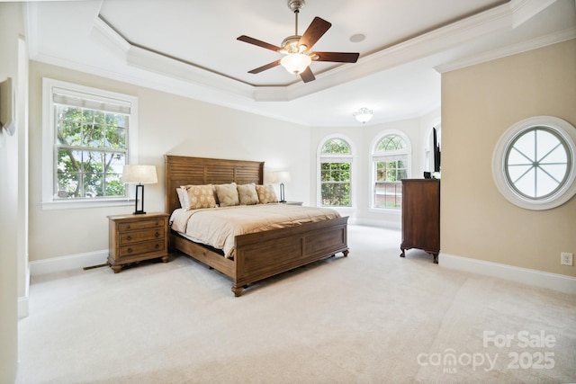 6795 Montgomery Rd, Lake Wylie, SC 29710 - carpeted bedroom featuring a raised ceiling, ornamental molding, baseboards, and ceiling fan
