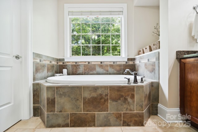6795 Montgomery Rd, Lake Wylie, SC 29710 - full bathroom featuring a garden tub, vanity, and tile patterned flooring