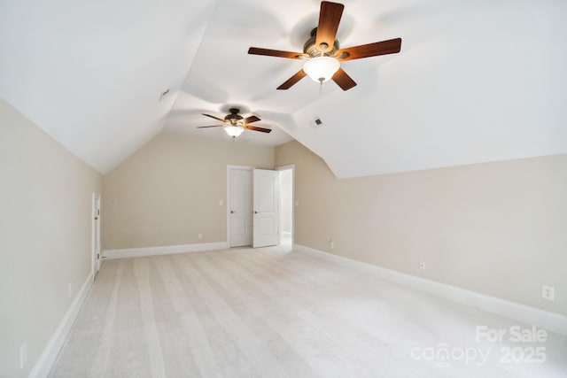 6795 Montgomery Rd, Lake Wylie, SC 29710 - additional living space with vaulted ceiling, a ceiling fan, baseboards, and light colored carpet