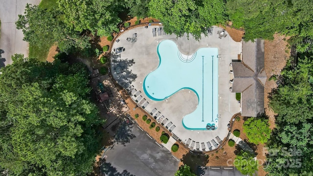 6795 Montgomery Rd, Lake Wylie, SC 29710 - aerial overview of property's location featuring a pool area and a tree filled landscape
