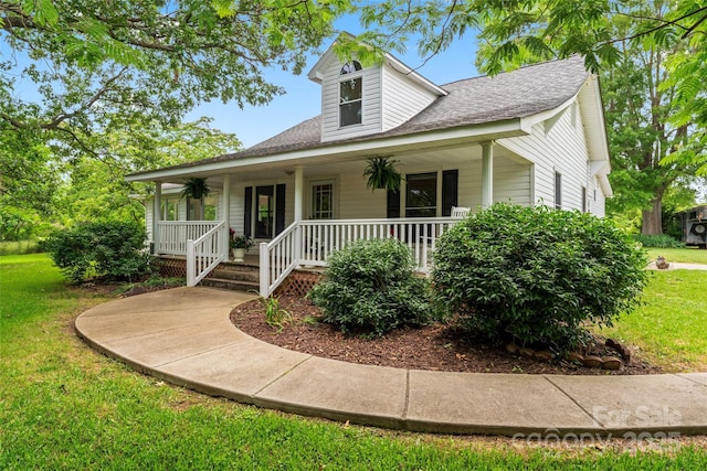 2315 Lanesboro Rd, Marshville, NC 28103 - view of front of house with a front lawn, a porch, and roof with shingles