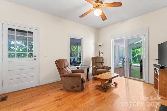 2315 Lanesboro Rd, Marshville, NC 28103 - sitting room featuring light wood-type flooring, plenty of natural light, and a ceiling fan