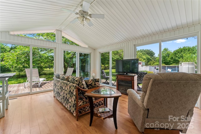 2315 Lanesboro Rd, Marshville, NC 28103 - sunroom / solarium featuring vaulted ceiling, a deck, and hardwood / wood-style floors