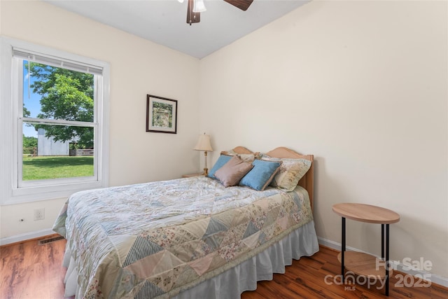 2315 Lanesboro Rd, Marshville, NC 28103 - bedroom with baseboards, wood finished floors, and ceiling fan