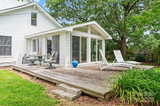 2315 Lanesboro Rd, Marshville, NC 28103 - wooden deck featuring a sunroom and outdoor dining area