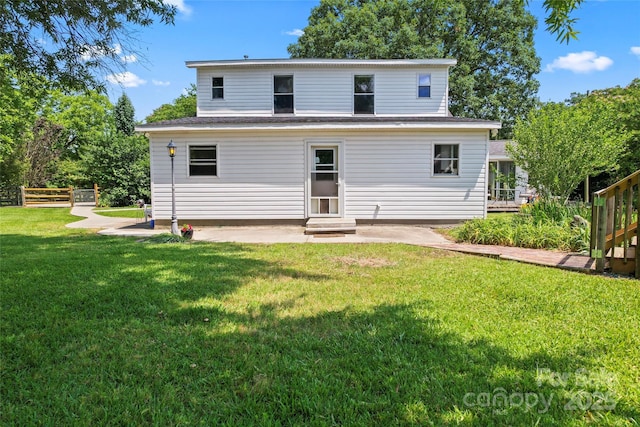 2315 Lanesboro Rd, Marshville, NC 28103 - rear view of house with a patio area and a shingled roof