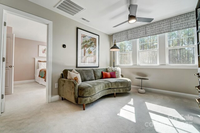 7513 Lancaster Hwy Unit 6, Waxhaw, NC 28173 - carpeted living room featuring a ceiling fan and baseboards