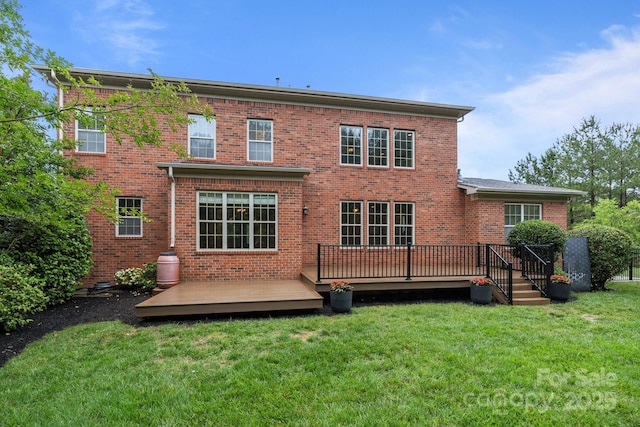3206 Lakehurst Xing, Matthews, NC 28104 - back of property with brick siding, a yard, and a wooden deck