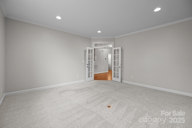 3206 Lakehurst Xing, Matthews, NC 28104 - empty room with french doors, crown molding, baseboards, recessed lighting, and carpet floors