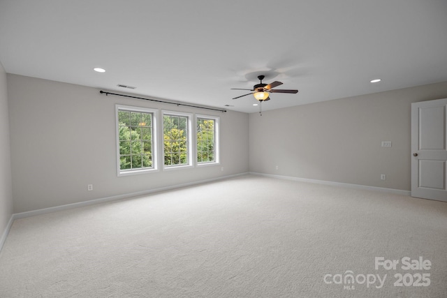 3206 Lakehurst Xing, Matthews, NC 28104 - unfurnished room with light colored carpet, a ceiling fan, baseboards, and recessed lighting
