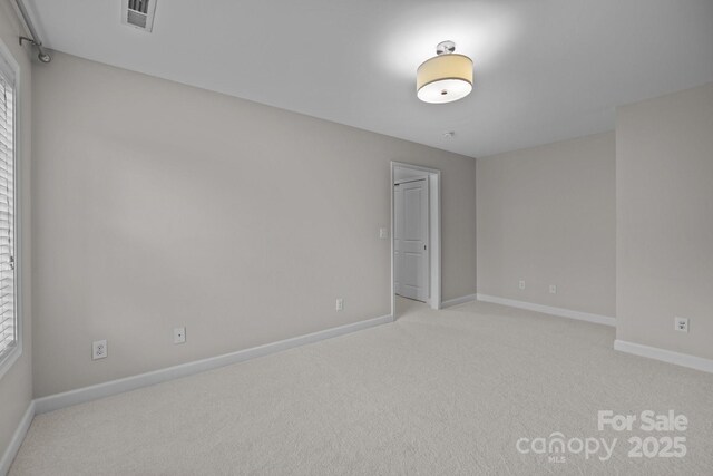 3206 Lakehurst Xing, Matthews, NC 28104 - empty room with light carpet and baseboards