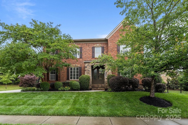 3206 Lakehurst Xing, Matthews, NC 28104 - georgian-style home featuring brick siding