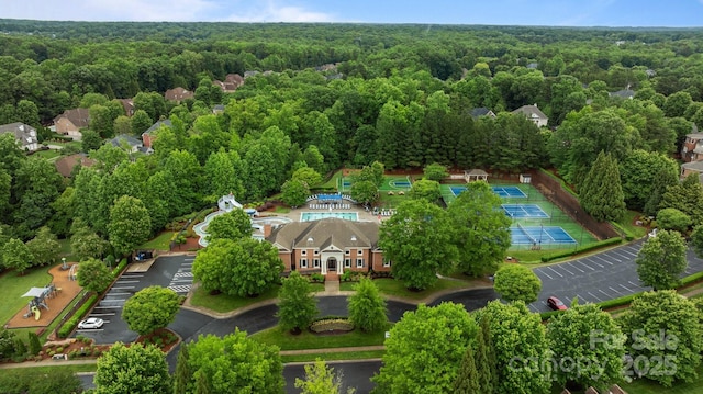 3206 Lakehurst Xing, Matthews, NC 28104 - aerial view of a heavily wooded area