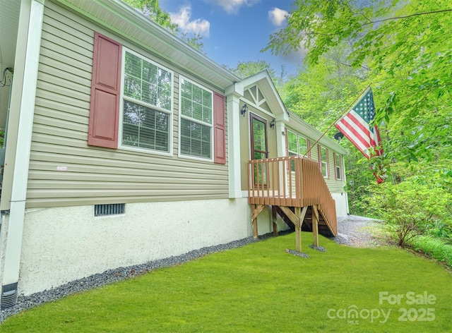 225 Opal Dr, Whittier, NC 28789 - view of side of property with a lawn and crawl space