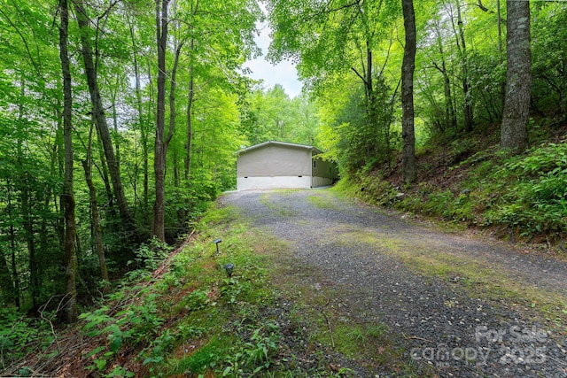 225 Opal Dr, Whittier, NC 28789 - garage featuring a forest view