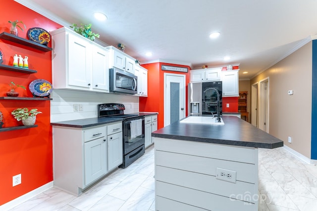225 Opal Dr, Whittier, NC 28789 - kitchen with stainless steel appliances, light marble finish flooring, dark countertops, a sink, and open shelves