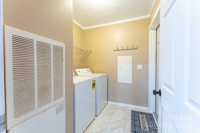 225 Opal Dr, Whittier, NC 28789 - laundry room featuring a heating unit, washing machine and clothes dryer, electric panel, light marble finish floors, and ornamental molding