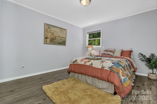 35 Avondale Rd, Asheville, NC 28803 - bedroom with crown molding, baseboards, and wood finished floors
