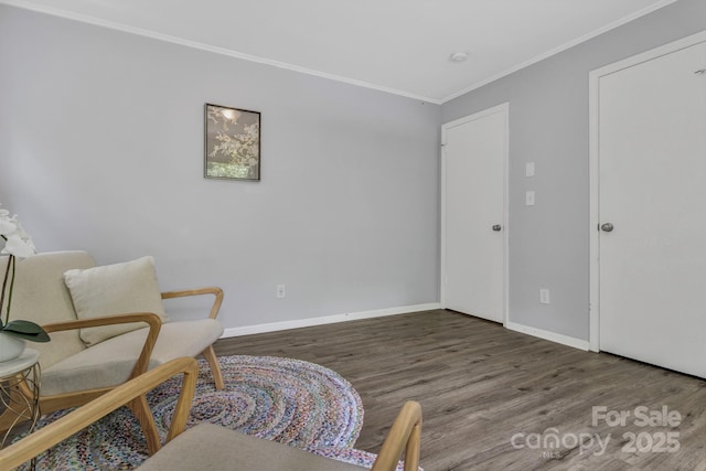 35 Avondale Rd, Asheville, NC 28803 - living area featuring crown molding, wood finished floors, and baseboards