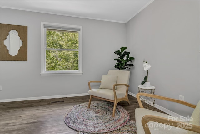 35 Avondale Rd, Asheville, NC 28803 - living area featuring crown molding, wood finished floors, and baseboards