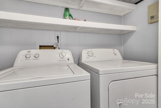 35 Avondale Rd, Asheville, NC 28803 - laundry room featuring independent washer and dryer and a decorative wall