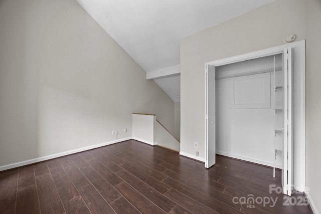 415 W 7th St Unit H, Charlotte, NC 28202 - bonus room featuring vaulted ceiling, wood finished floors, and baseboards