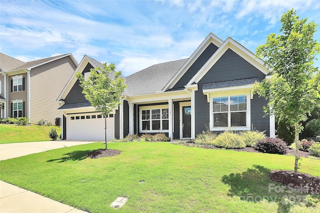 163 Crenshaw Pl NW, Concord, NC 28027 - view of front of property featuring driveway, a front lawn, an attached garage, and a shingled roof